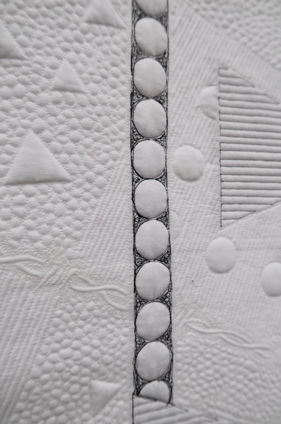 "Deportation" by Jackie Benedetti, quilted by Rachael Dorr - Back Detail 1